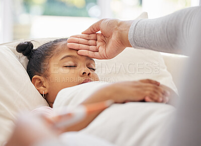 Buy stock photo Sick, child and sleeping in bed with hand touch on head, care and health in comfort and safety. Young girl, parent and temperature with fever, blanket and eyes closed in home for wellness or recovery