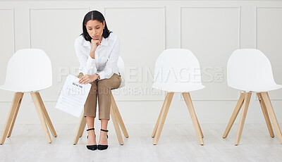 Buy stock photo Recruitment, waiting room and nervous woman with resume for job interview, opportunity or meeting at office. Hiring, anxiety and girl employee with onboarding stress, fear or overthinking cv mistake