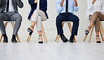 Unknown group of diverse businesspeople waiting for interview. Team of applicants sitting together. Professional men and women candidates in line for job opening, vacancy and opportunity in office