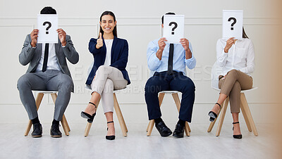 Buy stock photo Poster, thumbs up or girl portrait with team in waiting room for interview, faq or information. Recruitment, question mark or business people art hr office with sign for onboarding, hiring or steps