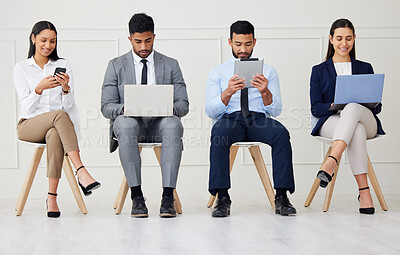 Buy stock photo Technology, job interview and business people waiting in queue for recruitment process in office. Human resources, meeting and group of hiring candidates with phone, laptop and tablet for vacancy.