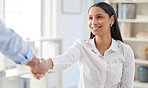 Two mixed race businesspeople in handshake after signing contract in interview. Hispanic applicant meeting CEO, hiring manger. Candidate hired for job opening, vacancy, office opportunity, promotion