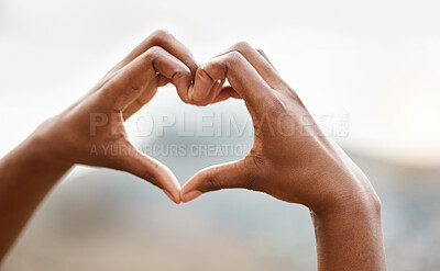 Buy stock photo Hands, person and outdoor with heart sign, symbol and start morning with kindness, gratitude and nature. Love, shape and icon with care, emoji and romance on holiday at sunrise in Rio de Janeiro