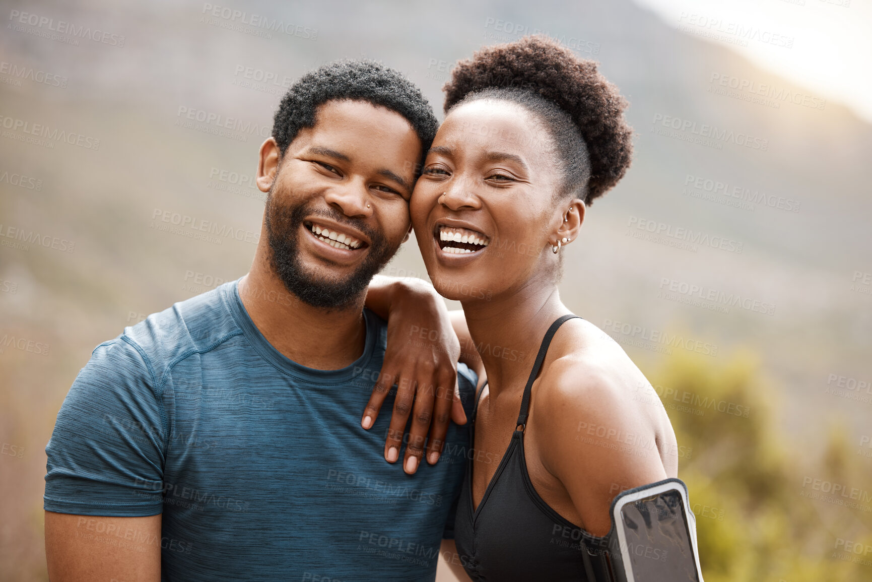 Buy stock photo African couple, fitness and portrait in nature with hug, care and smile for health, training and exercise. Black woman, man and excited with connection for workout, wellness and support in mountains