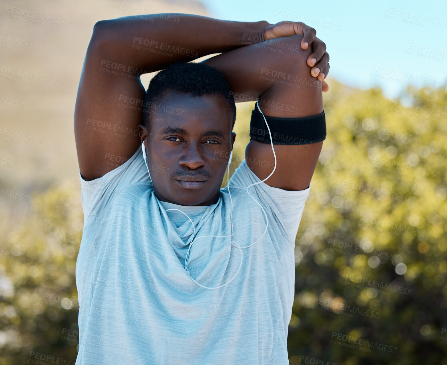 Buy stock photo Portrait, black man and stretching arms for fitness with outdoor exercise, wellness and muscle preparation in park. Nature, African guy and athlete with warm up for workout, body health and training