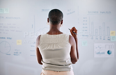 Buy stock photo Black woman, back and planning strategy on whiteboard  with data or analytics at startup business. Brainstorming, thinking and financial analyst with information, graph and chart for erp analysis