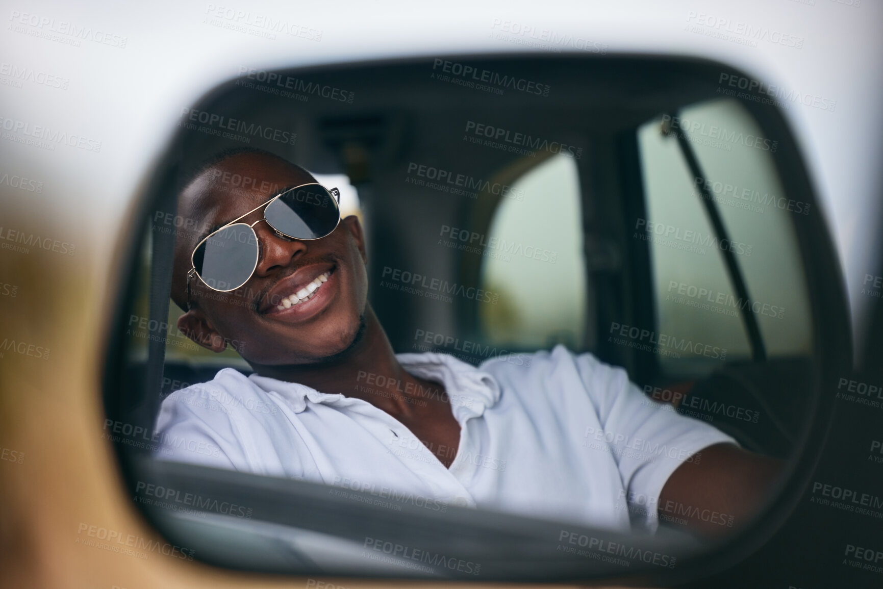 Buy stock photo Car, travel and black man with sunglasses by mirror for road trip, adventure or summer vacation. Happy, male person and reflection with smile in vehicle for weekend drive, holiday or tourism in Kenya