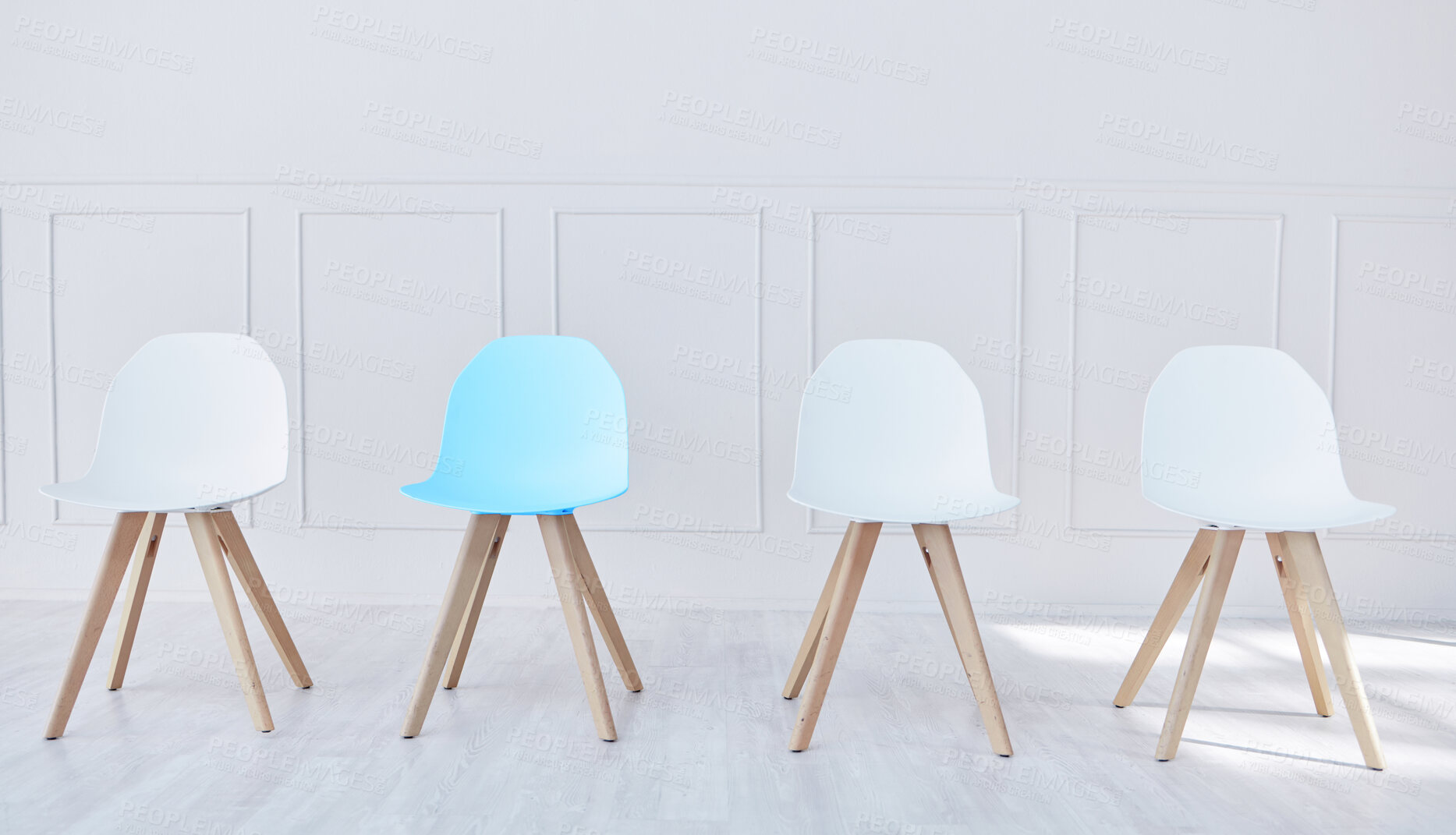 Buy stock photo Chairs, interview and empty office with wall for recruitment, onboarding or opportunity for talent at agency. Row, line and blue stool for choice, job and human resources in interior at workplace