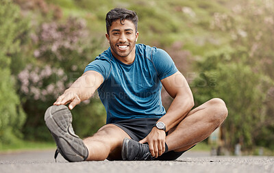 Buy stock photo Indian man, portrait and stretching leg for fitness, training and exercise for wellness with balance. Outdoor, road and male runner with warm up, preparation and getting ready for sports challenge