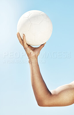 Buy stock photo Arm, hand and holding soccer ball, sports and fitness, muscle and strong, athlete training outdoor with blue sky. Sport motivation, soccer and closeup, exercise and workout for healthy active living.