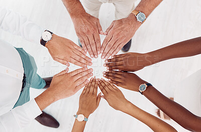 Buy stock photo Teamwork, support and hands of business people in circle for motivation, community and trust in office. Collaboration, diversity and top view of employees hands together for vision, growth and goals