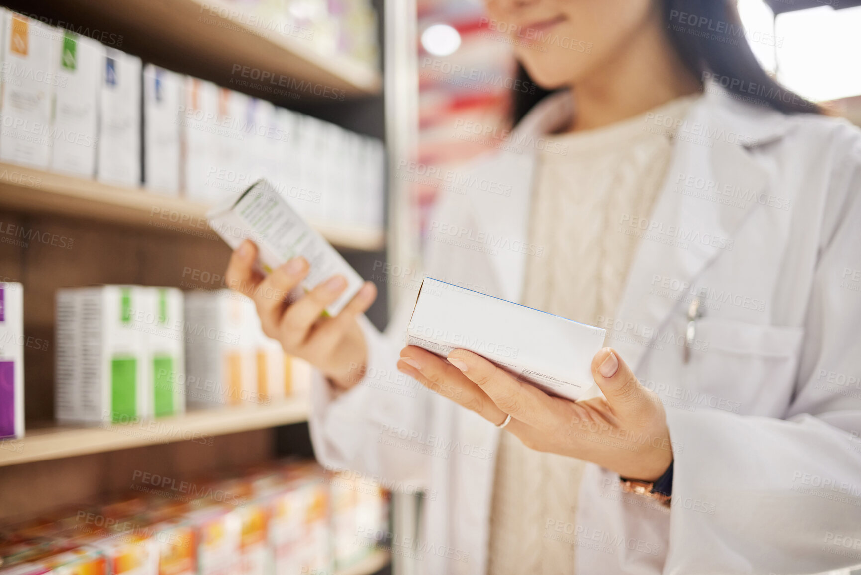 Buy stock photo Pharmacist, hands and medicine box, pills or medication for healthcare or wellness. Medical professional, product and woman with antibiotics, pharmaceutical supplements and reading label in pharmacy.