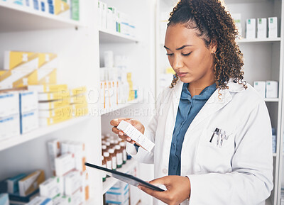 Buy stock photo Tablet, stock and healthcare with a woman in a pharmacy to fill an online order of prescription treatment. Medical, product and insurance with a female pharmacist working as a medicine professional