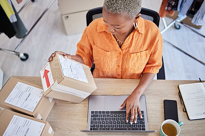 Buy stock photo Laptop, logistics or black woman with box for shipping, delivery or package in ecommerce online. Typing, above or business owner with product label or store order for cargo service or sticker sign