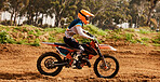 Motorcycle, training and speed with a sports man on space in the forest for dirt biking. Bike, fitness and power with a person driving fast on an off road course for freedom, challenge or performance