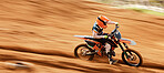 Motorcycle, sand and motion blur with a sports man on space in the desert for dirt biking. Bike, fitness and speed with a person driving fast on an off road course for freedom, power or performance