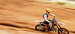 Motorcycle, speed and motion blur with a man training on space in the desert for dirt biking. Bike, fitness and sports with a person driving fast on an off road course for freedom or performance