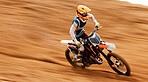 Motorcycle, balance and motion blur with a sports man on space in the desert for dirt biking. Bike, fitness and power with a person driving fast on an off road sand course for freedom or speed