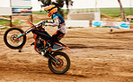 Motorcycle, power and motion blur with a sports man on space for dirt biking race or challenge. Bike, fitness and speed with a person driving fast on an off road course for freedom or performance