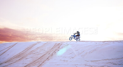 Buy stock photo Sand, freedom or athlete with motorcycle for action, adventure or fitness with performance for adrenaline. Sunset, sports or person on motorbike on dunes for training, exercise or race or challenge