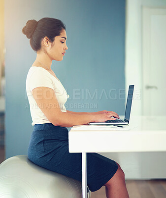 Buy stock photo Woman, laptop and planning in office for proposal, report and yoga ball for posture wellness. Female person, profile and employee for project management, online and web for research or copywriting