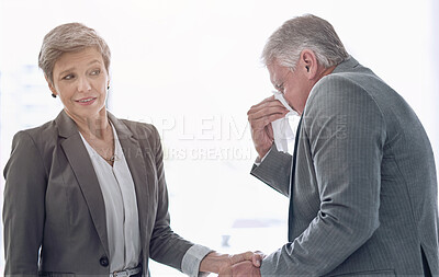 Buy stock photo Sneeze, tissue and businessman with hand shake, deal and allergies in meeting with female person. Sick or flu and partnership for deal or success, virus and influenza for infection with client 