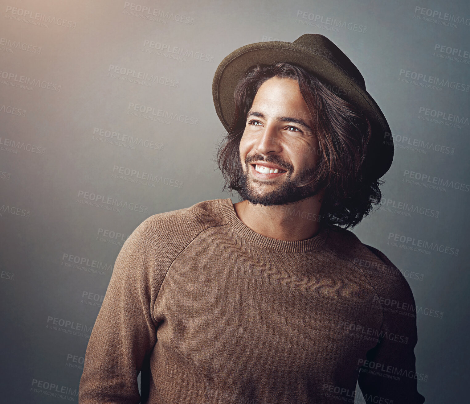 Buy stock photo Thinking, fashion and man with hat in studio for hipster style, remember or planning on dark background. Smile, aesthetic and male model for designer headwear, happiness or trendy outfit with mockup