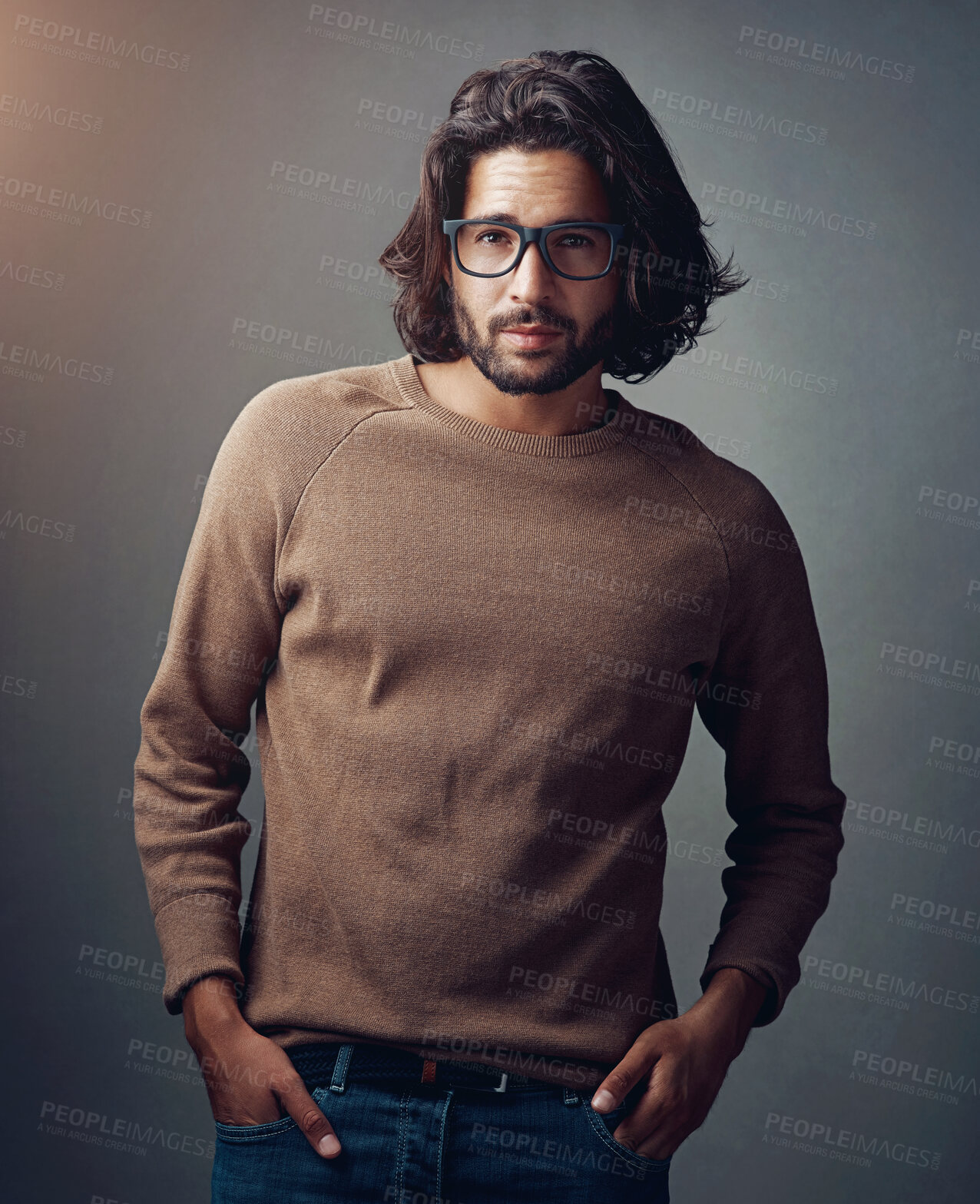 Buy stock photo Fashion, glasses and portrait of man in studio with stylish, elegant and winter outfit. Serious, spectacles and male model from Australia with trendy, cool and designer clothes by gray background.