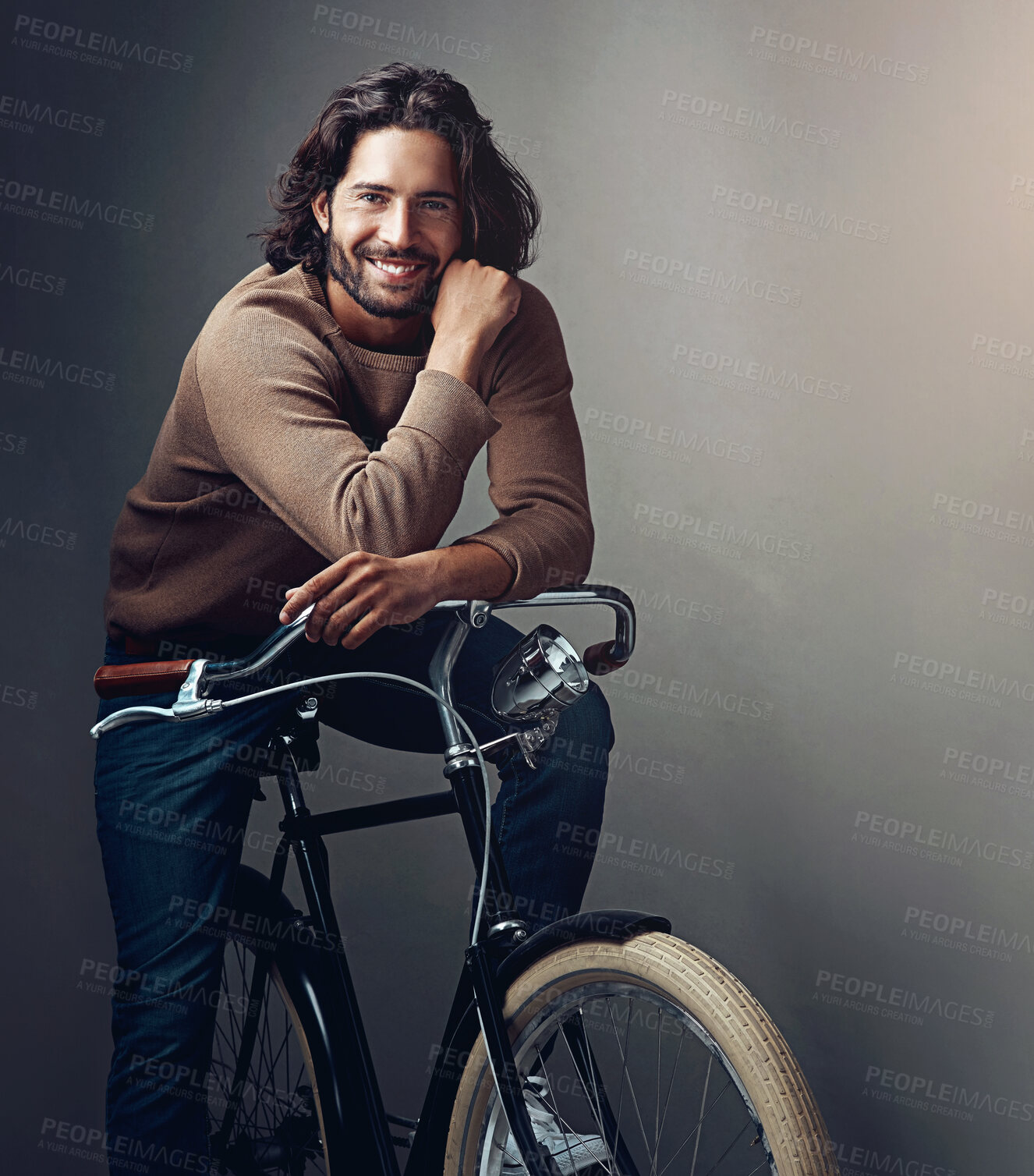 Buy stock photo Portrait, smile and man with bike, travel and wellness with sustainability on grey studio background. Person, model and guy with transport, eco friendly and cycling with fitness, carbon footprint