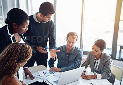 Buy stock photo Business people, laptop and cooperation with conversation, group and professional in modern office. Diversity, employees and coworkers with ideas, collaboration and teamwork with document and meeting