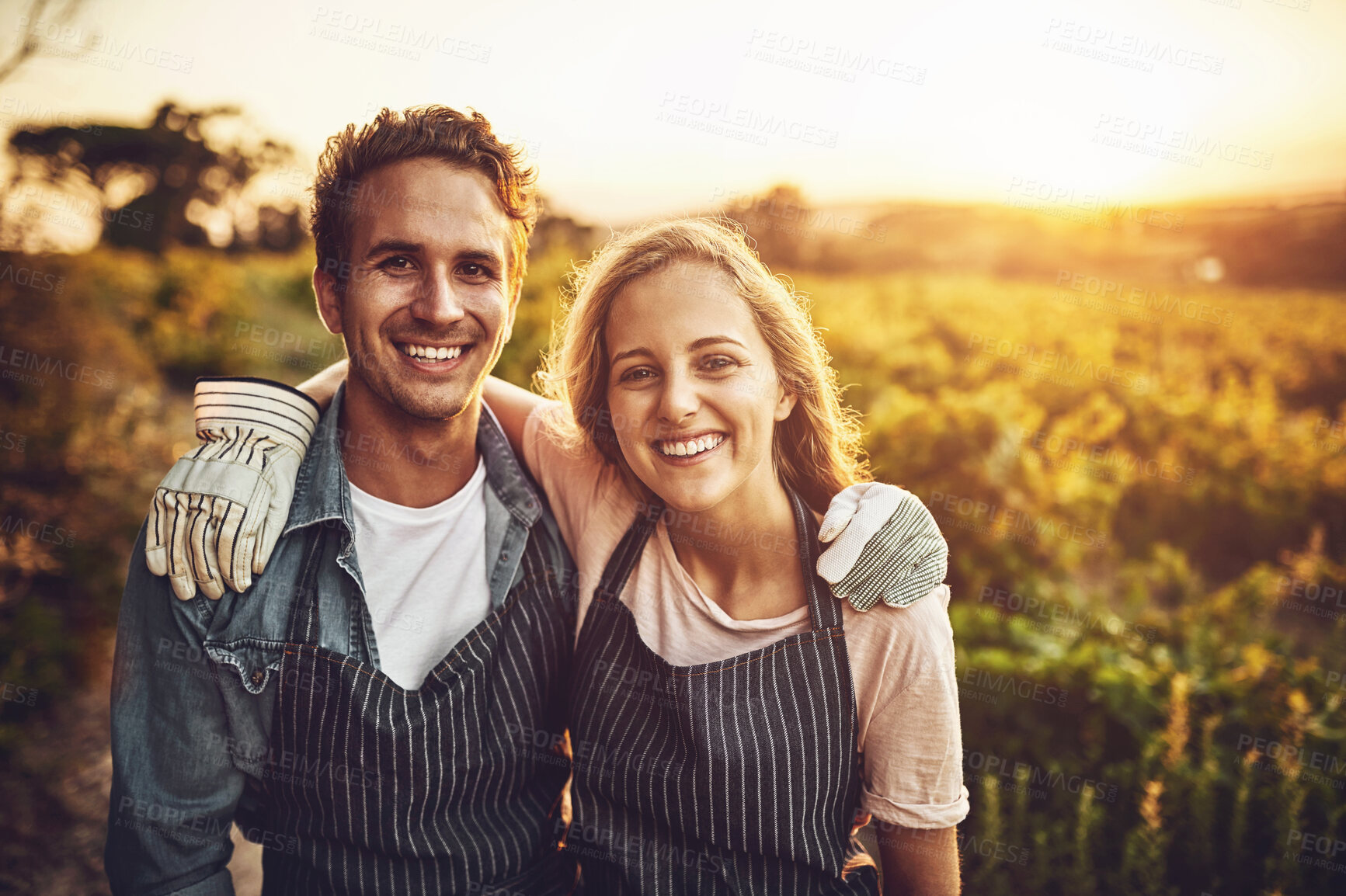 Buy stock photo Love, hug and smile with couple on farm for agriculture, growth and wine. Teamwork, bonding and portrait with man and woman in grape field of countryside for vineyard, sustainability and environment