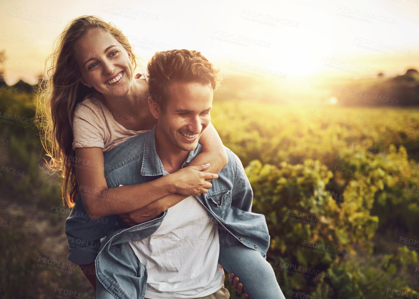 Buy stock photo Piggyback, couple and nature field at sunset on horizon with plants, farmer and organic with embrace. Farm, agriculture and romance at countryside with smile, hug and relationship in America