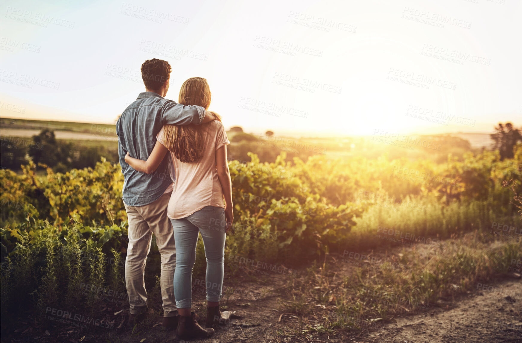 Buy stock photo Back, hug and couple in morning, countryside and together in field , love and date for anniversary. Sunrise, partner and person with embrace, nature and peace in grass and relax in Texas in farm