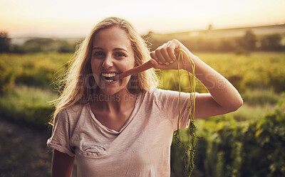 Buy stock photo Nature, eating and portrait of woman with carrot on farm for tasting harvest nutrition vegetables. Smile, healthy and female person with crunchy, organic and fresh produce for vitamins in countryside