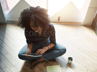 Buy stock photo Woman, tablet and remote work from home office on floor with coffee in morning, reading and scroll on web. Person, digital touchscreen and writer with thinking, schedule and above on app in house