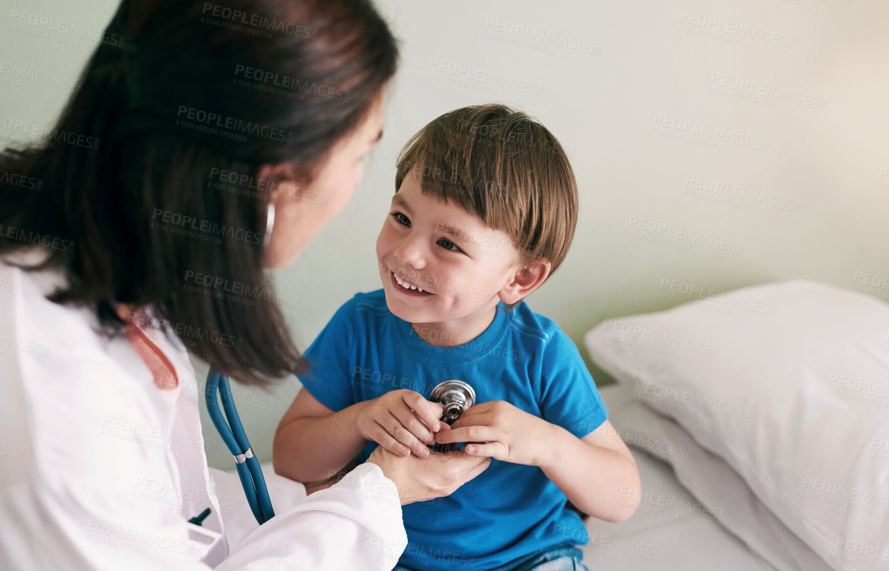 Buy stock photo Doctor, stethoscope and child in hospital for healthcare, health and wellness with medical exam. Female pediatrician, assessment and patient in clinic for heart, lungs and cardiology with breathing