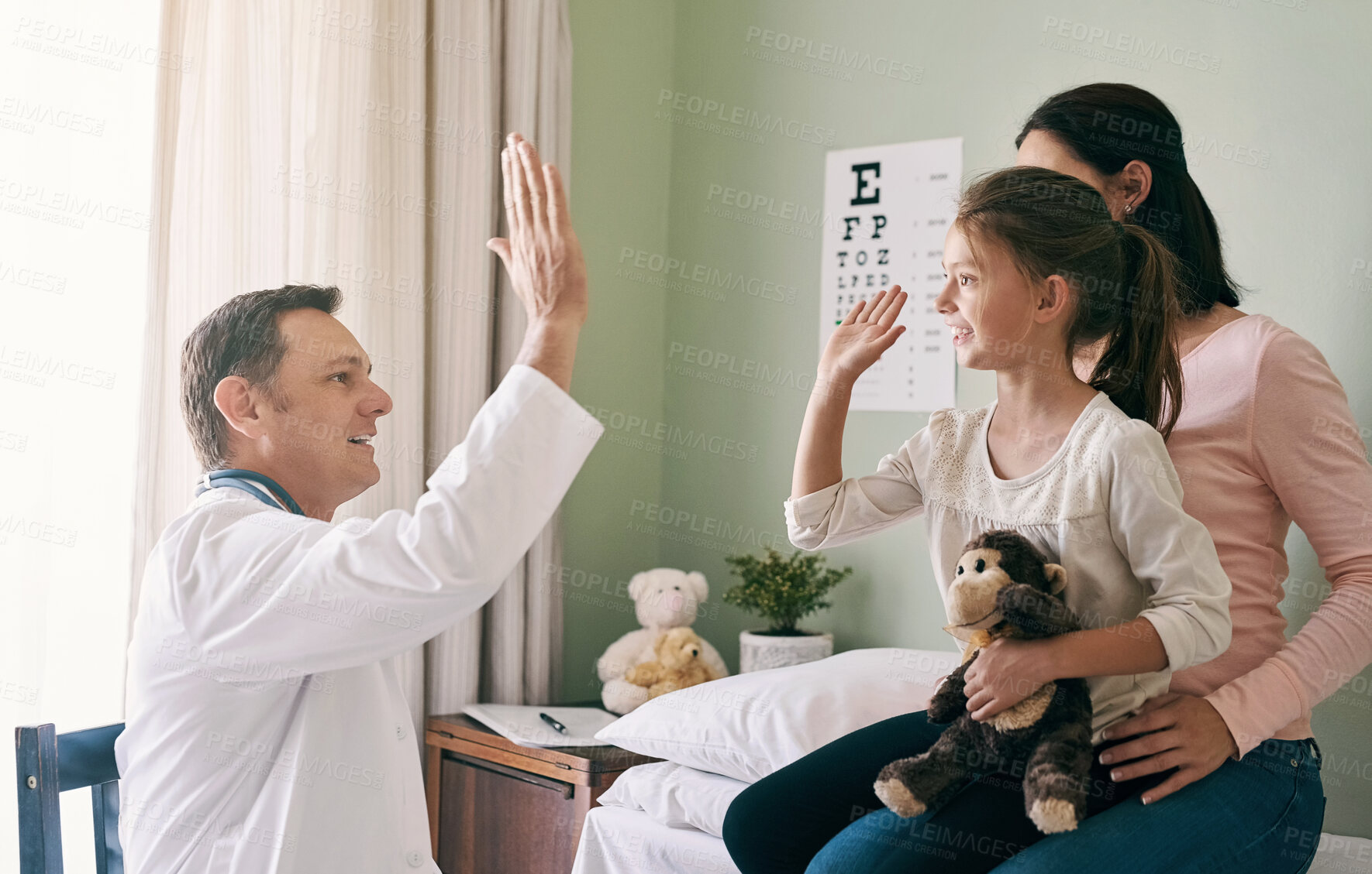 Buy stock photo Healthcare, high five and support with family at pediatrician for advice, checkup or consulting.  Doctor, medical and thank you with man in office of hospital for cure, recovery or treatment success