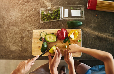 Buy stock photo Food, nutrition and diet with hands, chopping and ingredients for salad on kitchen counter for dinner. Healthy, meal prep and vegetables with avocado, pepper and pasta for clean eating in family home