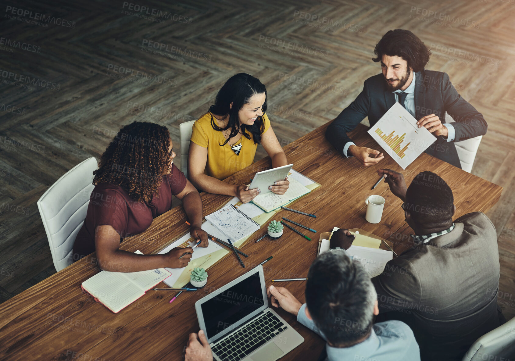 Buy stock photo Business people, documents and meeting with discussion for brainstorming, planning or collaboration above at office. Top view of group or employees discussing paperwork, statistics or corporate data