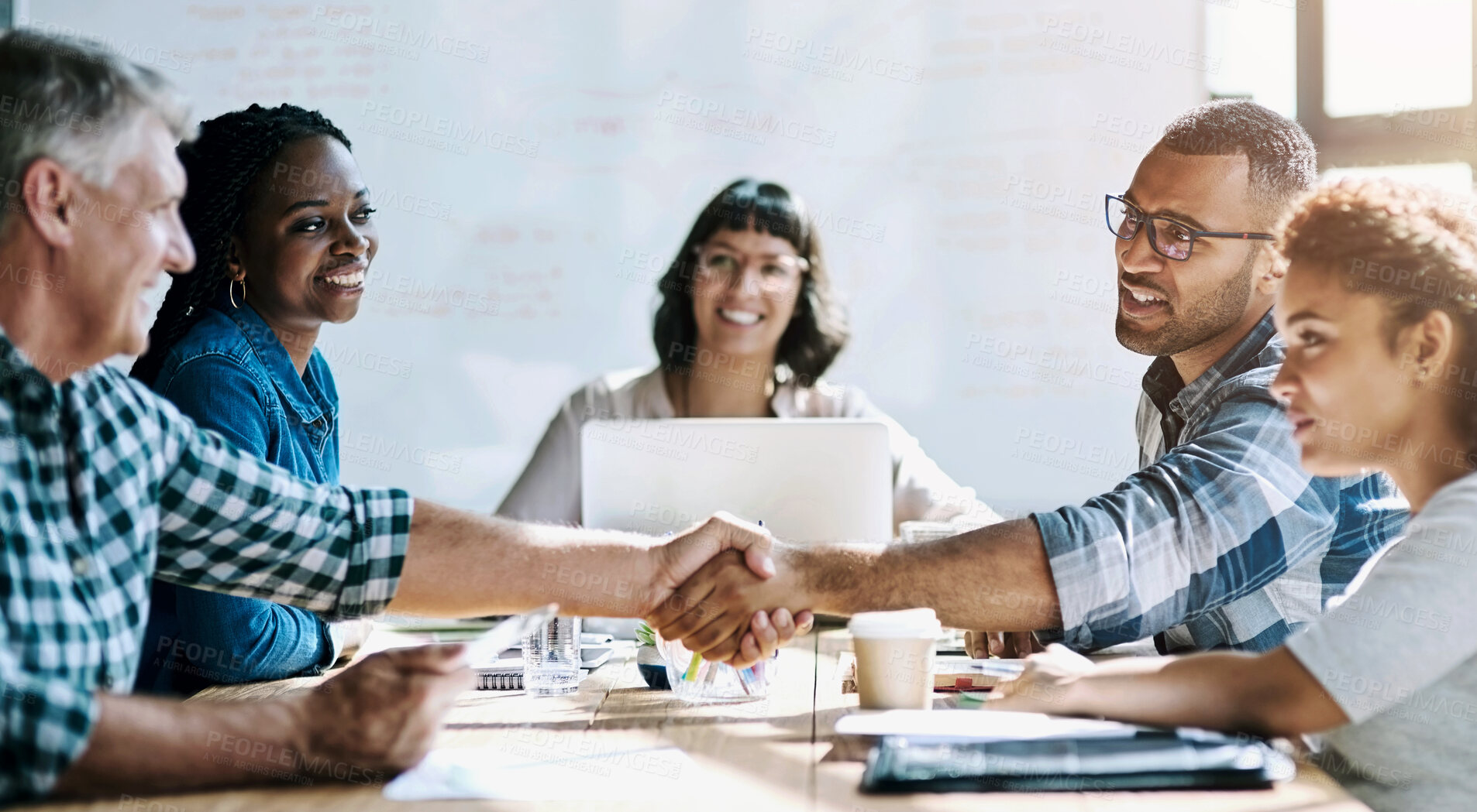 Buy stock photo Group, handshake and business people in meeting, teamwork and planning for project, feedback and agreement. Staff, employees or negotiation for company merger, cooperation and collaboration in office