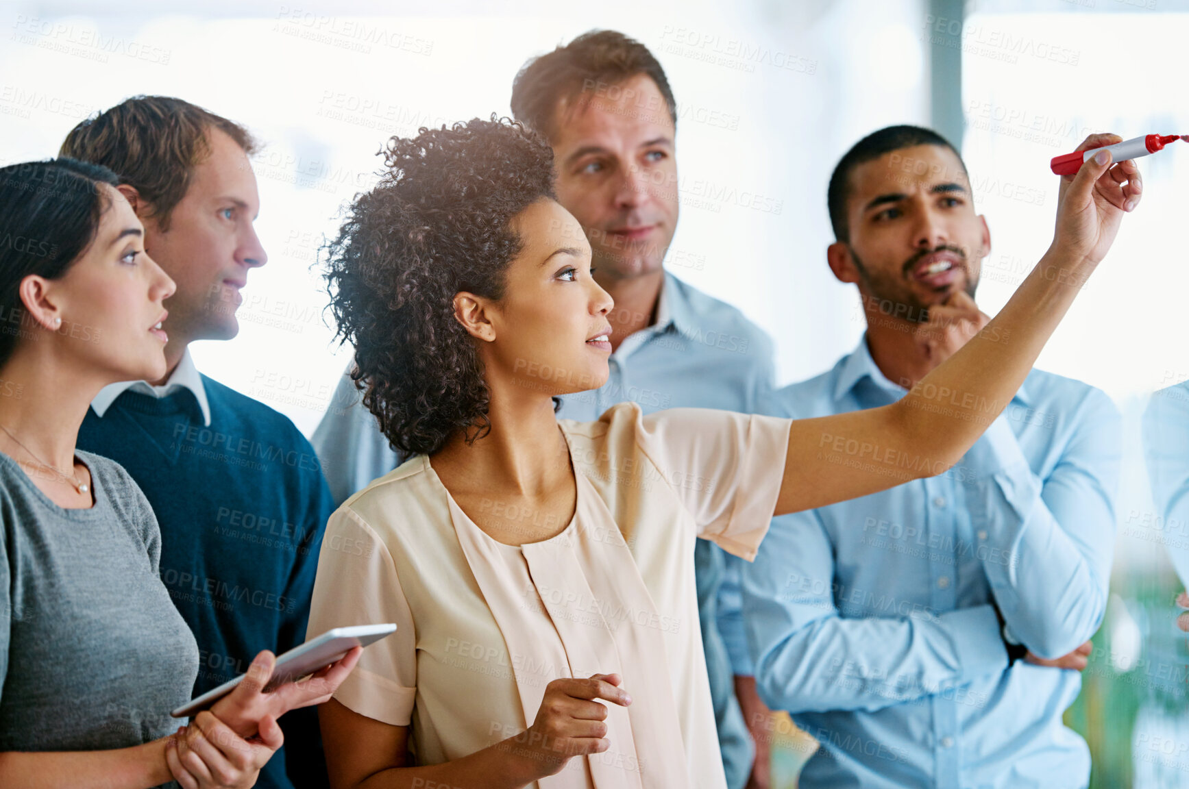 Buy stock photo Business people, writing and coaching with glass board for schedule planning, tasks or agenda at office. Group of young and creative employees taking notes for discussion, brainstorming or startup