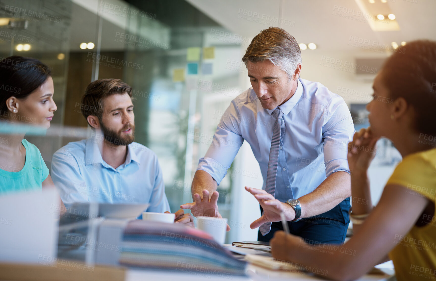 Buy stock photo Businessman, meeting and speaking in office for planning, ideas and collaboration support of project pitch. Men, woman and discussion for brainstorming, feedback or teamwork in workshop for goals