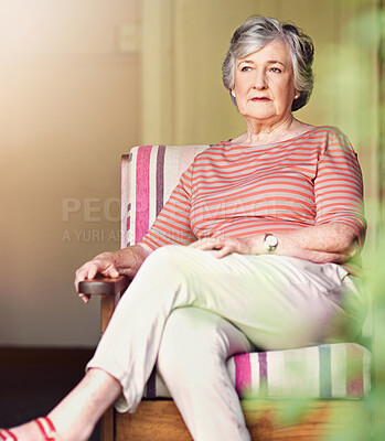 Buy stock photo Senior woman, relax and thinking on chair in home for retirement, memory and nostalgia. Female person, thoughtful and calm in seat for remembering history, past experiences and contemplating pension