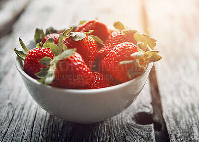 Buy stock photo Strawberry, bowl and table with healthy food and fruit for wellness, nutrition and to lose weight. Home, breakfast and sustainable meal or health snack with vitamin A and diet dessert for eating