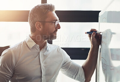 Buy stock photo Office, man and writing in whiteboard for strategy or planning and ideas as project manager. Business, employee and serious with mission or vision and solution for company growth at workplace