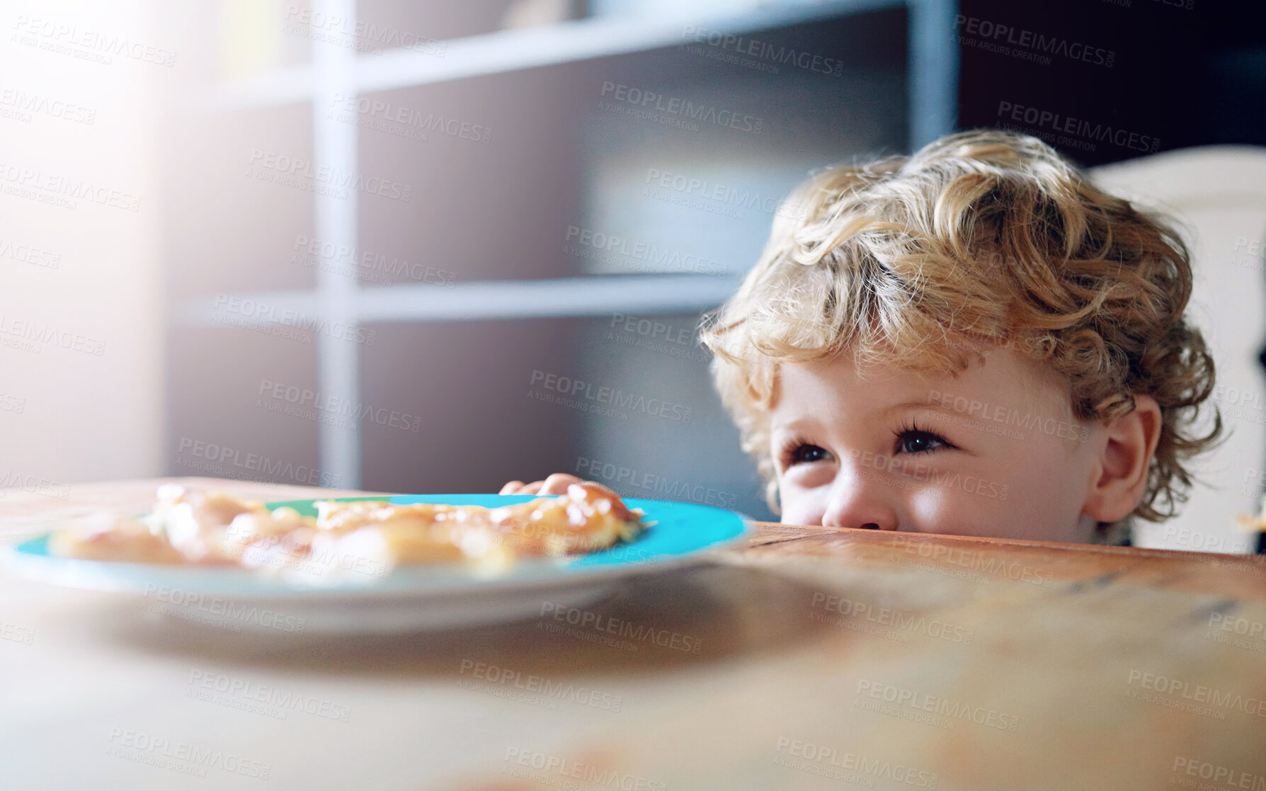 Buy stock photo Home, boy and kid in kitchen, lunch on plate and curious with happiness, nutrition and wellness. Childhood, behaviour and furniture with food, healthy meal and table with cookies, biscuit and smile