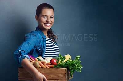 Buy stock photo Studio, farmer or woman in portrait with vegetables, nutrition and fresh products in basket by mockup. Small business, organic or harvest with female supplier, agriculture and food by gray background