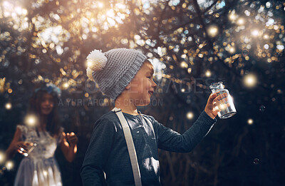 Buy stock photo Fireflies, jar and outdoor in nature at evening time with glow, shine and children playing in forest. Boy, girl and happy in woods as siblings with fantasy for unique mystical fairy and magic light