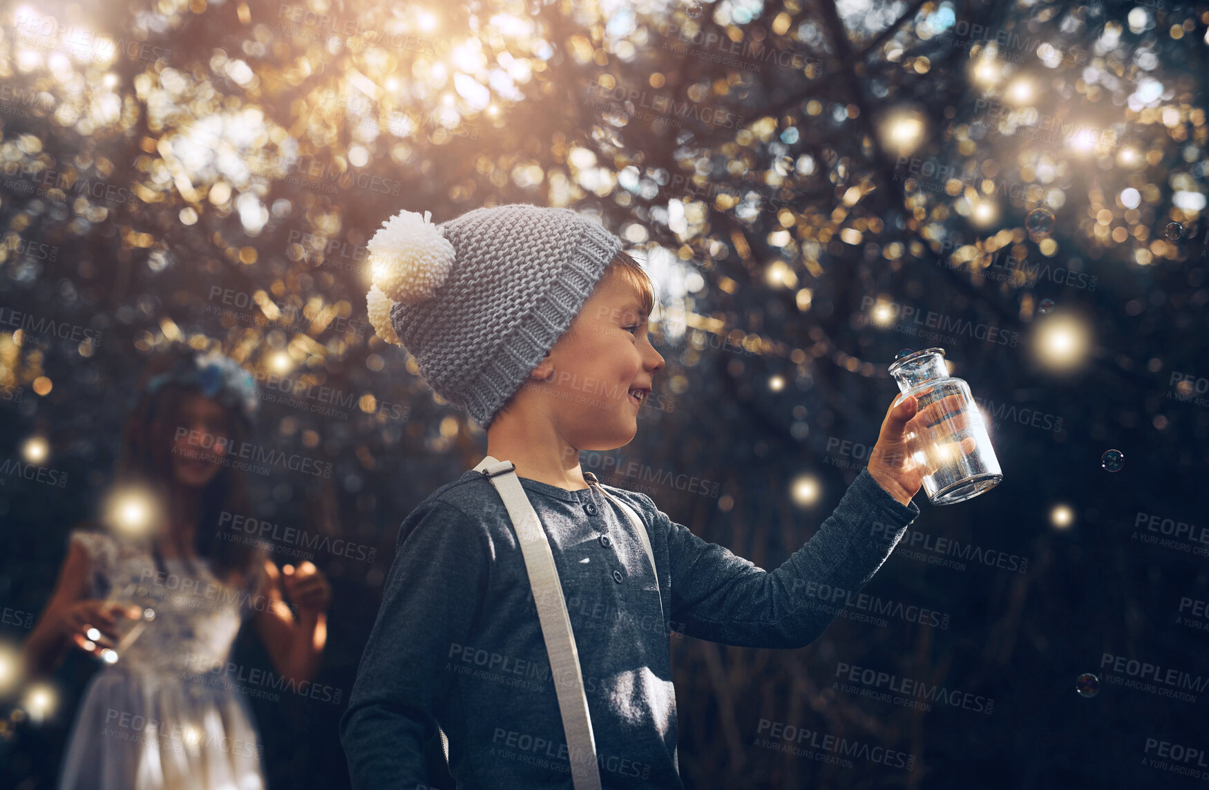 Buy stock photo Fireflies, jar and outdoor in nature at evening time with glow, shine and children playing in forest. Boy, girl and happy in woods as siblings with fantasy for unique mystical fairy and magic light