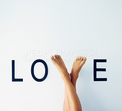 Buy stock photo  Love, word and feet of person with care, happiness and romance sign of emotion gesture. Text, gratitude and legs of model for expression of connection, commitment or devotion by white background.